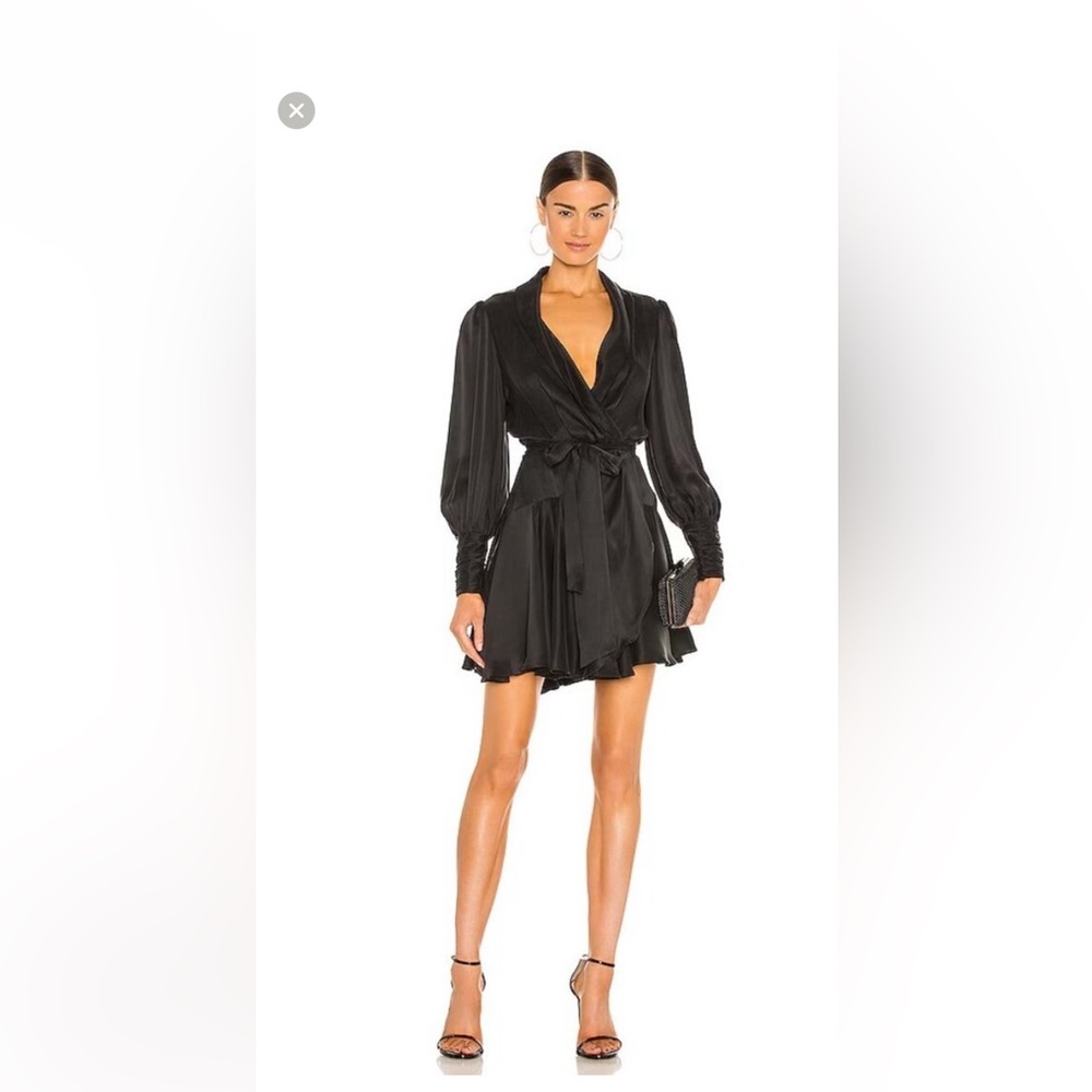 Zimmermann Silk Wrap Mini Dress in Black
Worn Once. Size 3.
